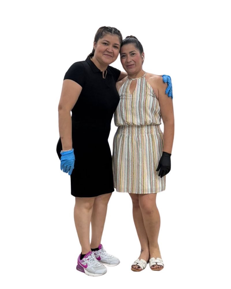 Two members of The Wishy Wash team standing side by side